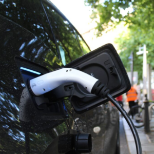 ENERCON EV Electric Vehicle Plug in a black car